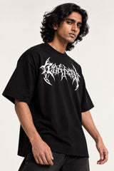 Black oversized tshirt with death metal text on front and white dark angel wings spine graphic on back, drop shoulder boxy fit, men India