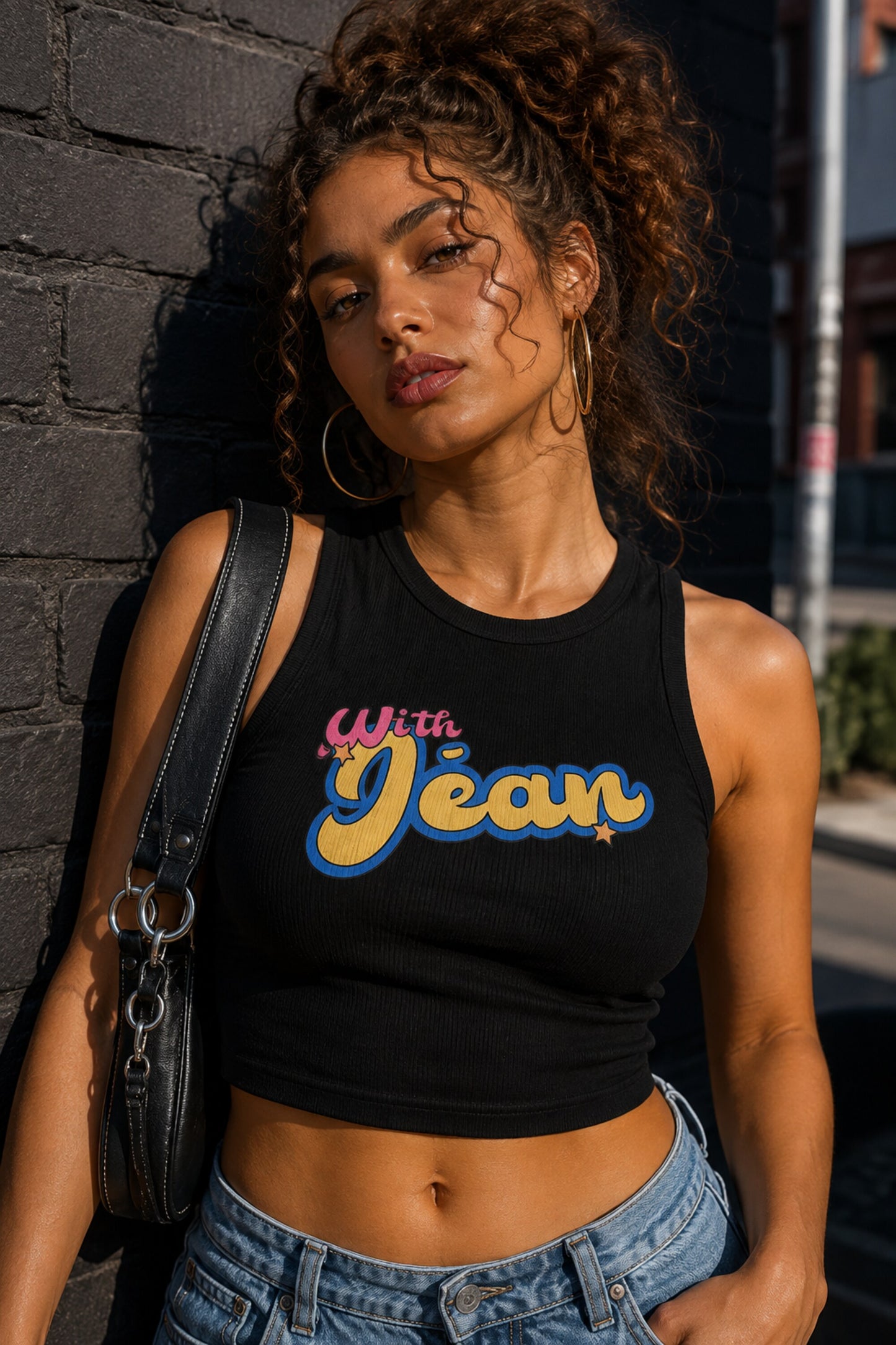 Black ribbed racerback crop tank top with With Jean retro groovy pink cursive and yellow blue text graphic Y2K aesthetic women top - black
