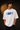 Red oversized t-shirt featuring a bold, blue and orange graphic of Ashwathama's eyes with "The Cursed Warrior" text. Model wearing the t-shirt. - white