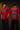 Red oversized t-shirt featuring a bold, blue and orange graphic of Ashwathama's eyes with "The Cursed Warrior" text. Model wearing the t-shirt. - red