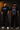 Red oversized t-shirt featuring a bold, blue and orange graphic of Ashwathama's eyes with "The Cursed Warrior" text. Model wearing the t-shirt. - black