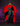 Red t-shirt with a graphic of a superhero in black on a hanger against a dark background