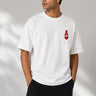 Man wearing a white oversized t-shirt with a large red Ace of Hearts graphic and 'pretty lucky' text on the back. Streetwear fashion. - white