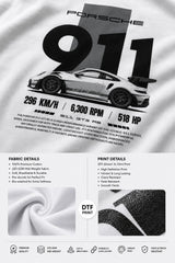 White t-shirt with Porsche 911 graphic and technical specifications on fabric texture background