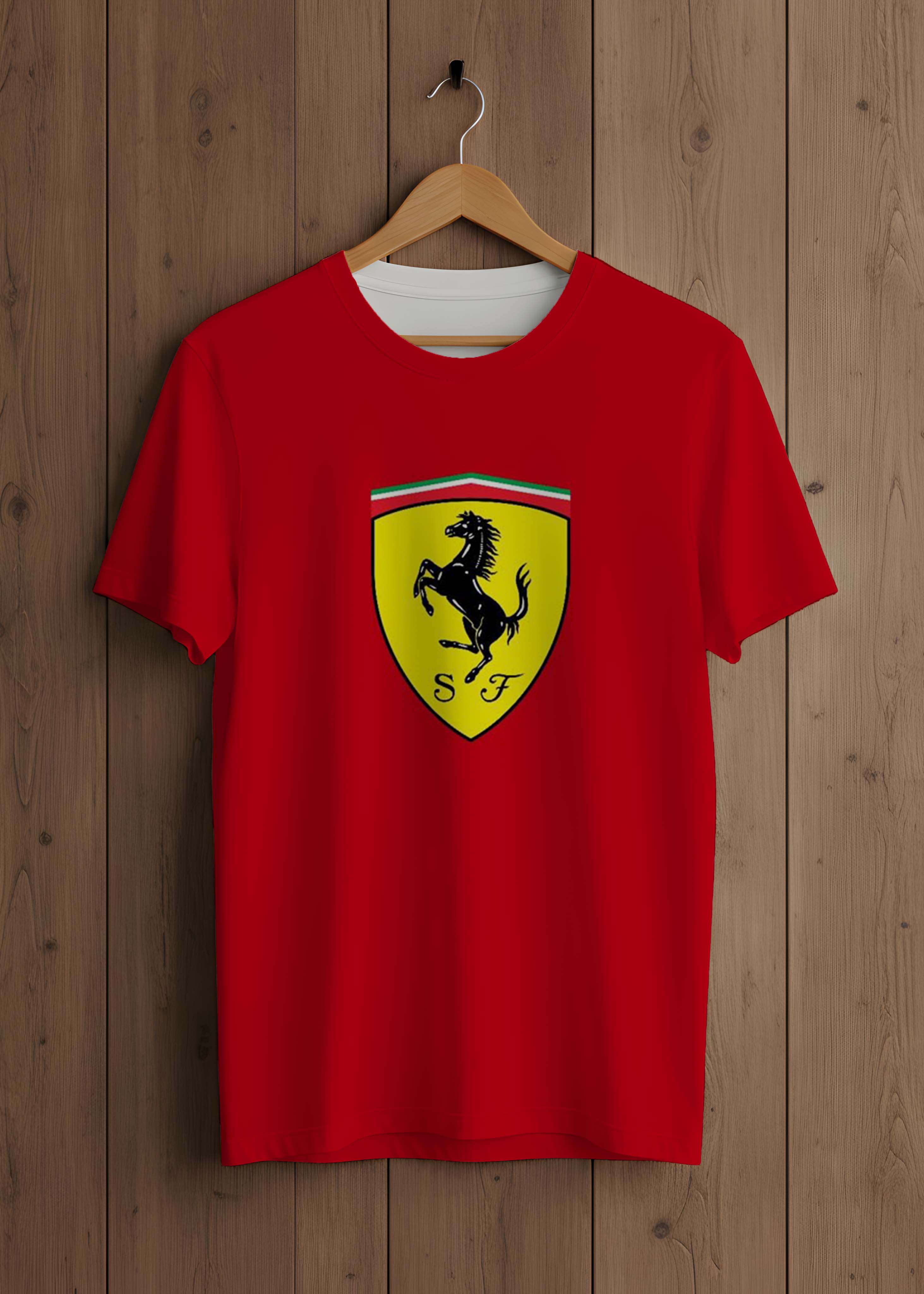 Red t-shirt with a Ferrari logo on a wooden background