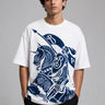 Man wearing a black kuwansugg DESIGN oversized t-shirt with a white graphic print of a knight on a horse. The t-shirt is made of premium cotton.