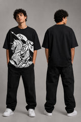 Man wearing a black kuwansugg DESIGN oversized t-shirt with a white graphic print of a knight on a horse. The t-shirt is made of premium cotton. - black