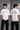 Black Mercedes-Benz and AMG oversized t-shirt with red stripe detail. Features the iconic Mercedes-Benz star logo and AMG lettering. Styled for a premium streetwear look. - white