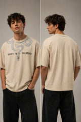 Beige oversized t-shirt with a detailed vintage-style grey snake graphic and 'MOVE IN SILENCE' text. The fabric is soft-washed premium cotton. - beige