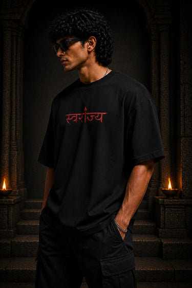 BHAARIGEAR Swaraj Shivaji oversized t-shirt in black, featuring a vibrant red graphic of Shivaji Maharaj against a blood moon. Designed for modern streetwear enthusiasts.