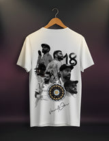 White Virat Kohli t-shirt with black and gray graphic design on a hanger against a dark background